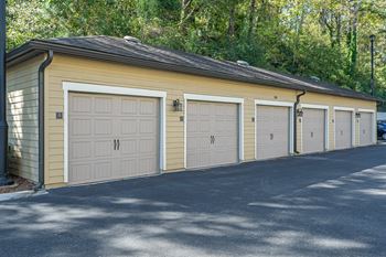 A row of garage doors are closed.